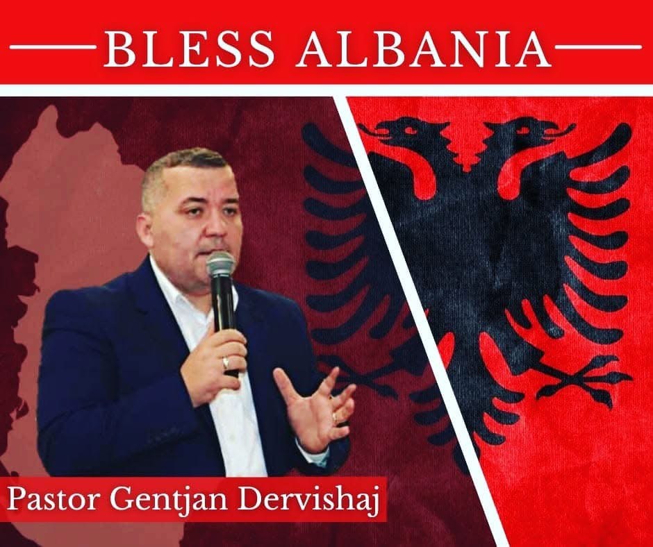 Pastor Gentjan Dervishaj speaking at a Bless Albania event